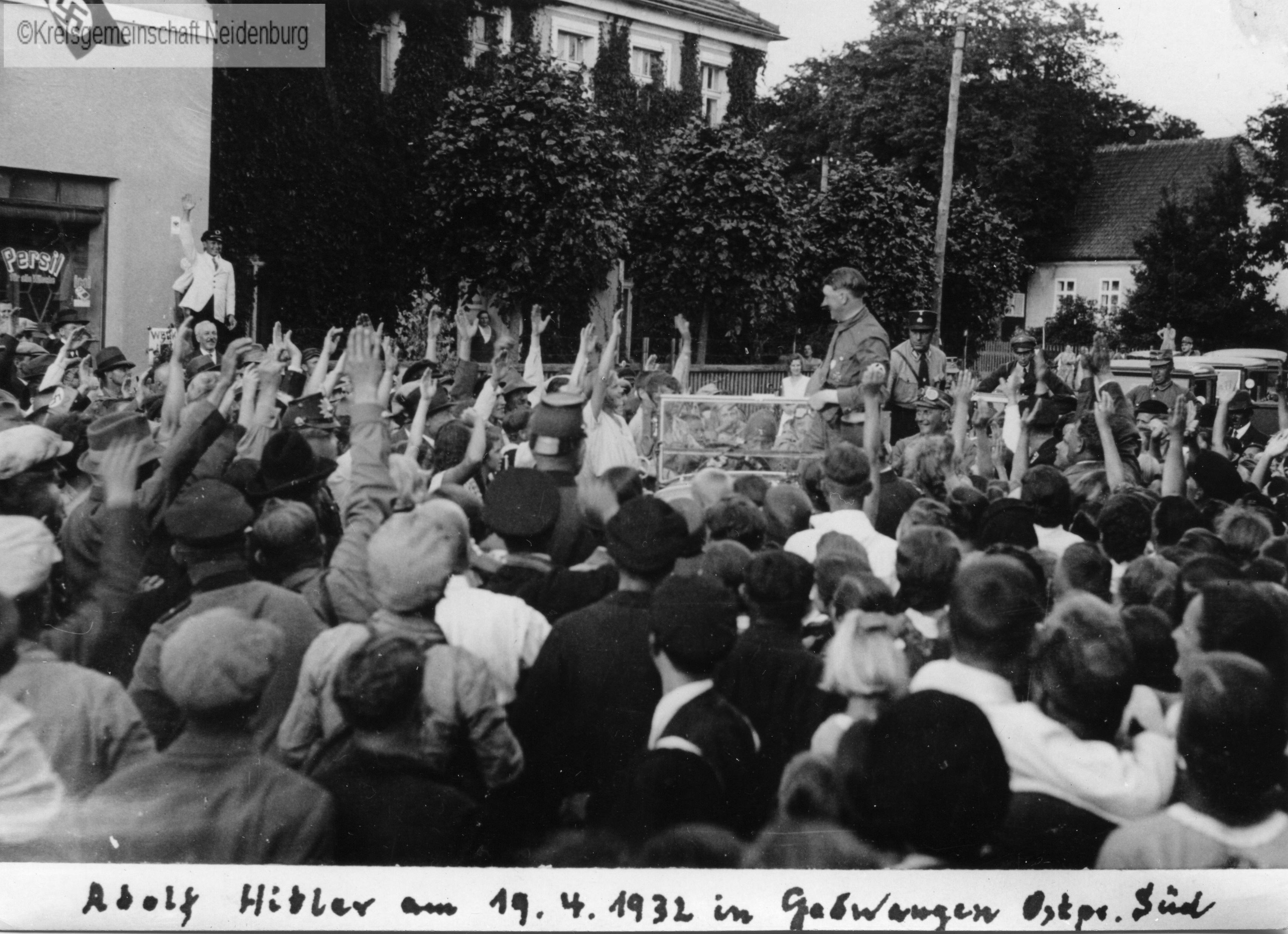 Adolf Hitler drives through Neidenburg